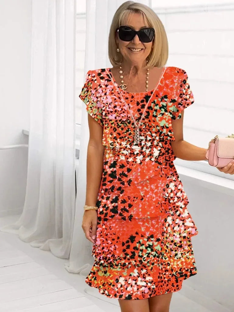 Brigitte – Vestido elegante y fluido con volantes